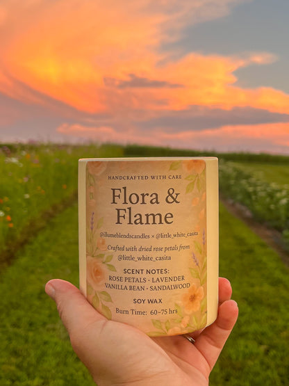 Hand-poured Flora & Flame collaboration candle with rose petals, lavender, vanilla bean, and sandalwood