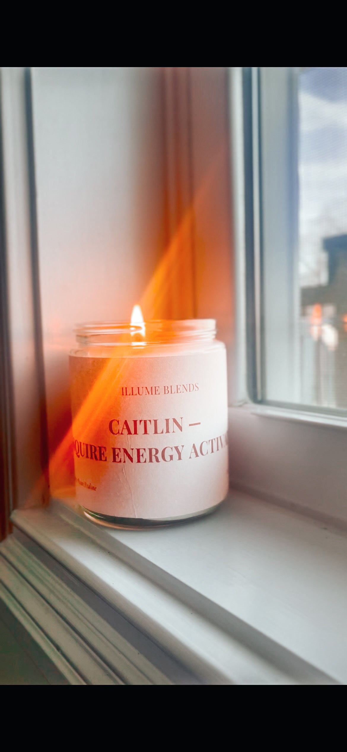 Custom hand-poured luxury candle with personalized Esquire Energy Activated label by Illume Blends