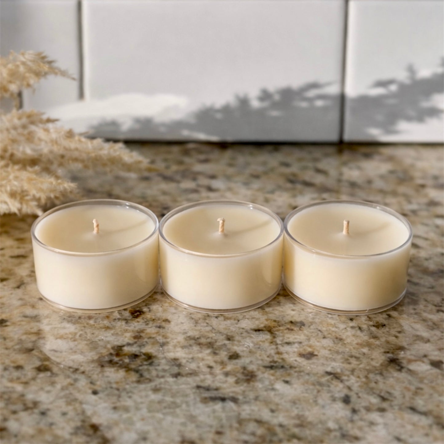 Hand-poured soy and coconut wax tealight trio add-on for sampling Illume Blends candle scents