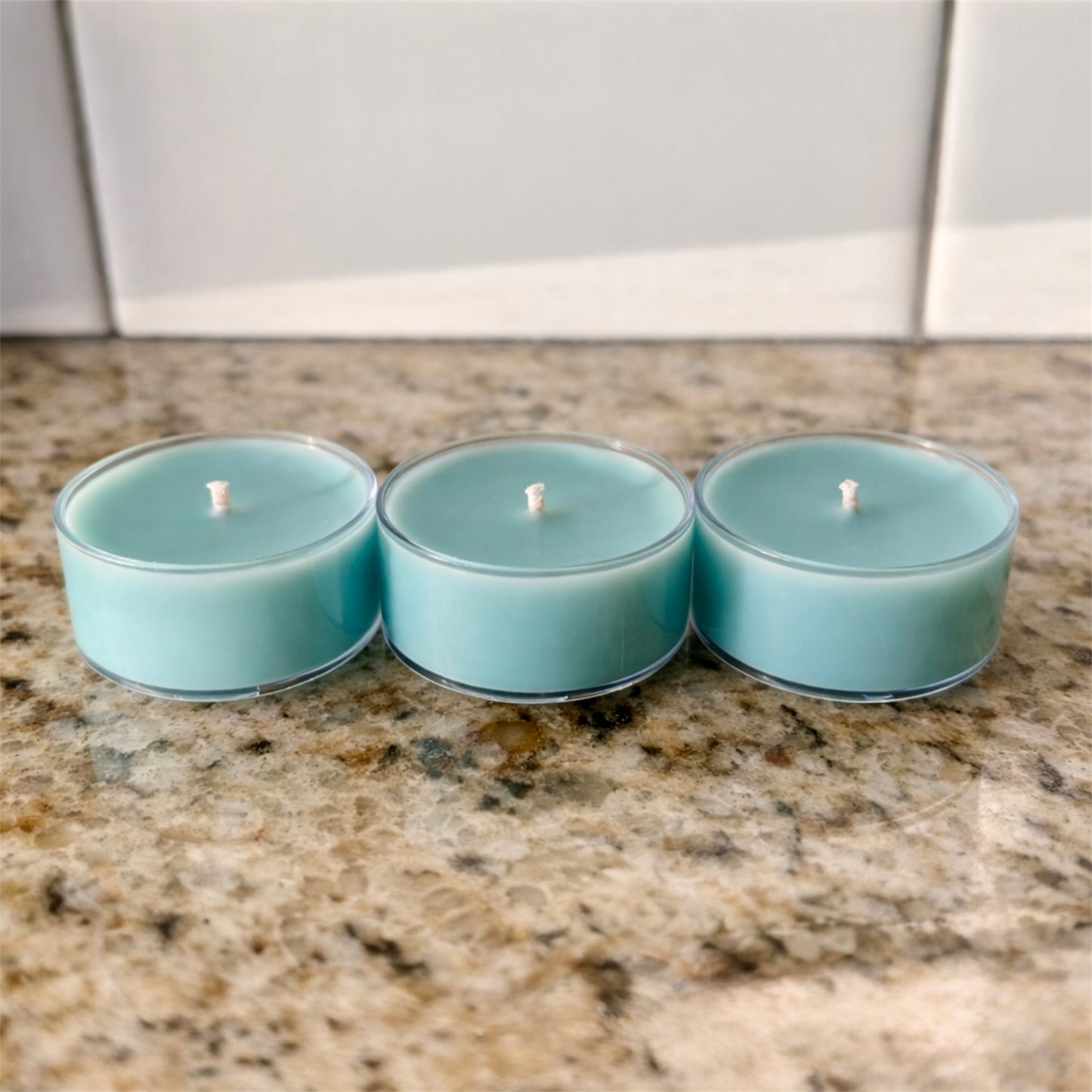Hand-poured soy and coconut wax tealight trio add-on for sampling Illume Blends candle scents