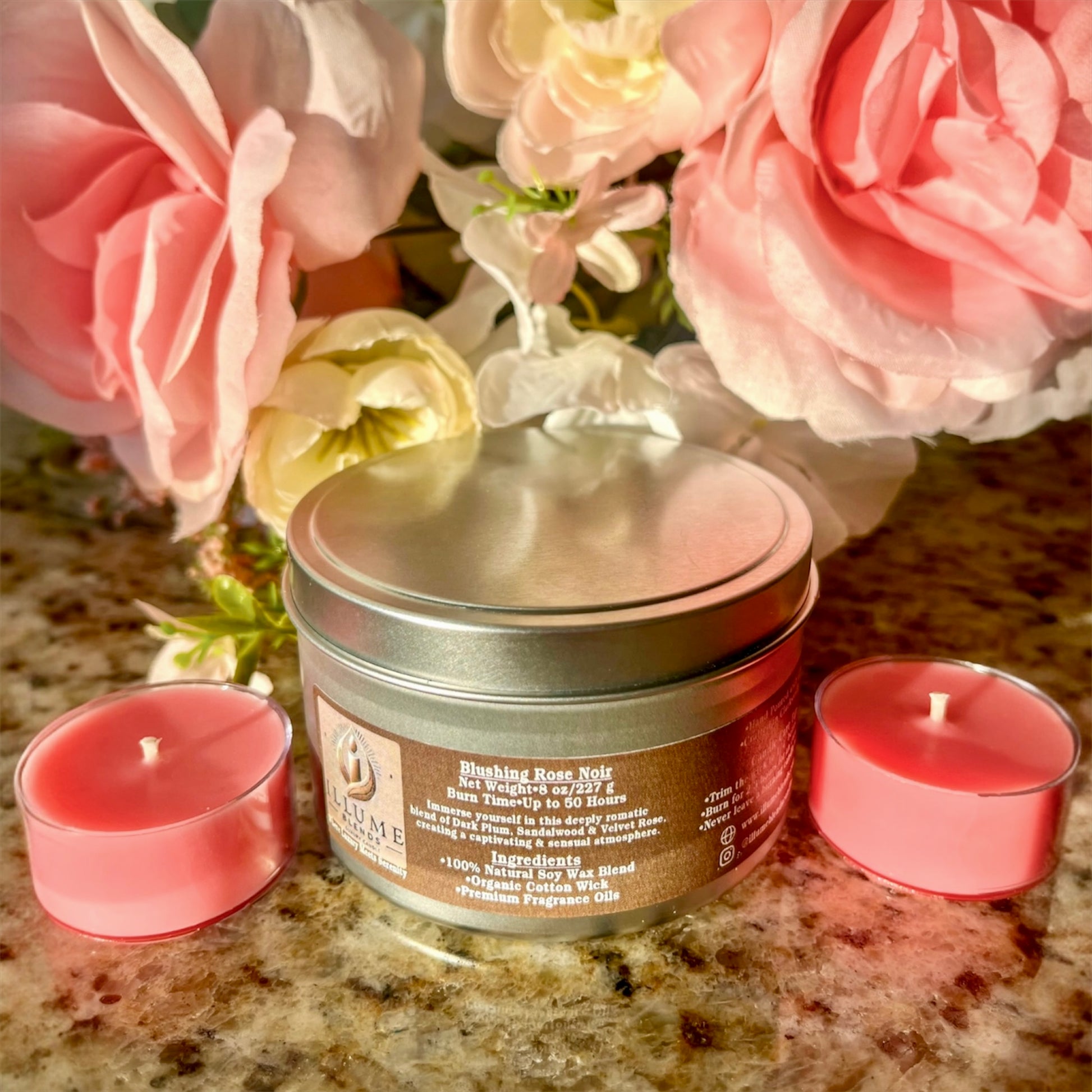 Top view of Blushing Rose Noir candle featuring handcrafted rose wax embed, rose petals, and smooth blush pink wax