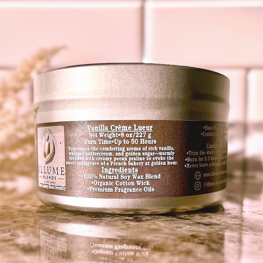Illume Blends Vanilla Crème Lueur 8 oz luxury candle inspired by a French bakery at golden hour, styled in warm natural light.